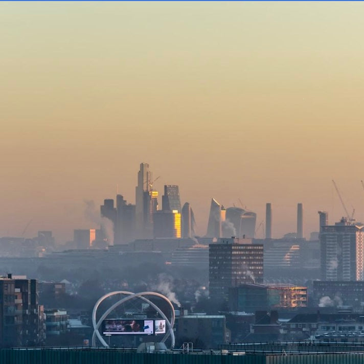 pollution in london with the london eye in the background