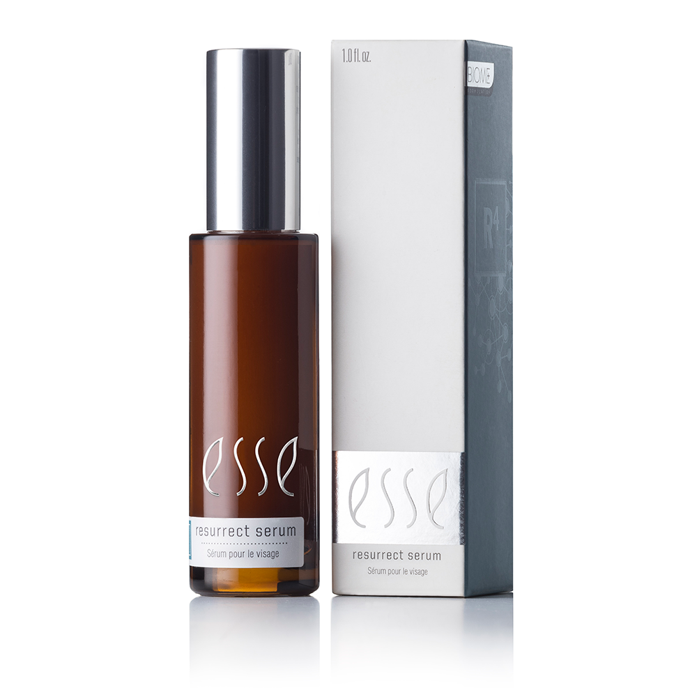 esse serum bottle placed next to its box