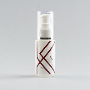 GFYS VITAMIN BOOSTER SERUM IN A WHITE PUMP BOTTLE WITH GFYS BRANDING
